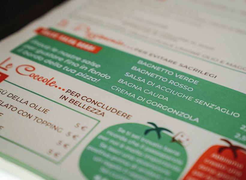Colorful menu with Italian sauces, evokes rich flavors and tradition.